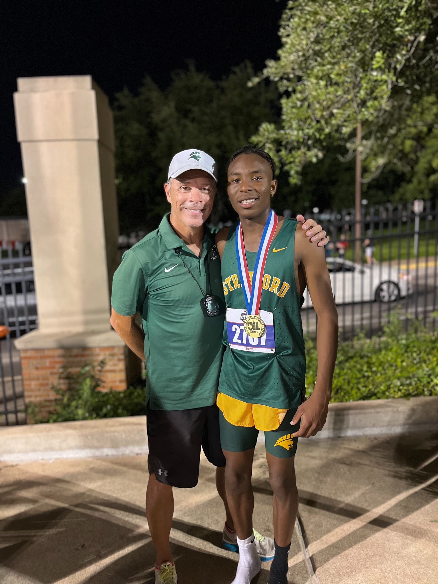 Shawn Siemers with Emanuel Galdino moments after winning the 2022 UIL 6A State Championship in the 1600m
